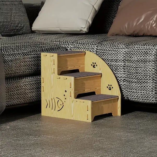 Wooden sofa steps to support dogs with mobility issues.